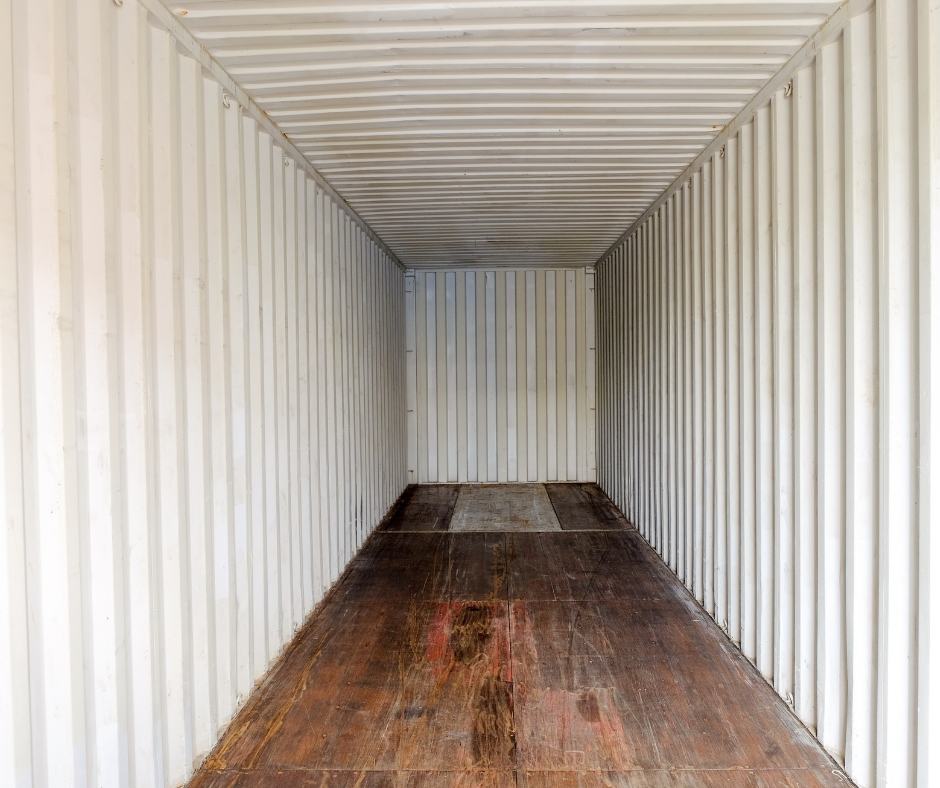 Shipping container interior with wood floor